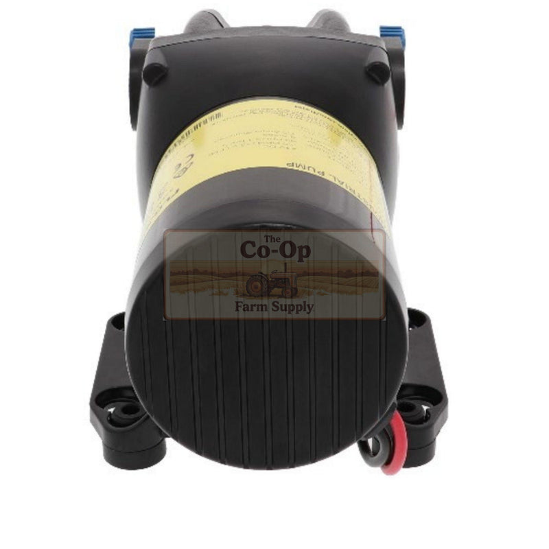 A black Flojet q351F-118s-2P pump with a yellow label and blue connectors, shown against a white background.