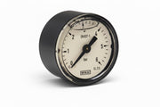 Pressure gauge with a white face and black casing on a white background, featuring the number 908006.