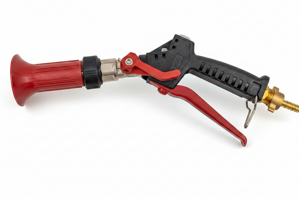 Red and black spray gun nozzle on a white background