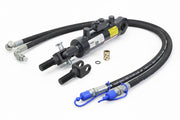 Hydraulic cylinder with hoses and connectors on a white background
