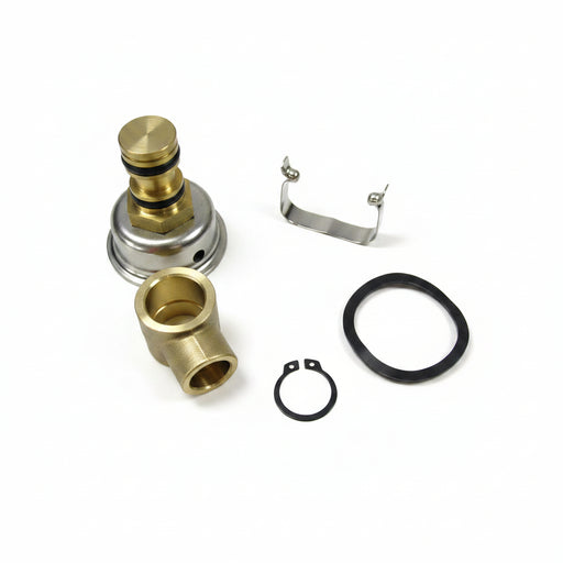 Set of brass and metal plumbing parts on a white background