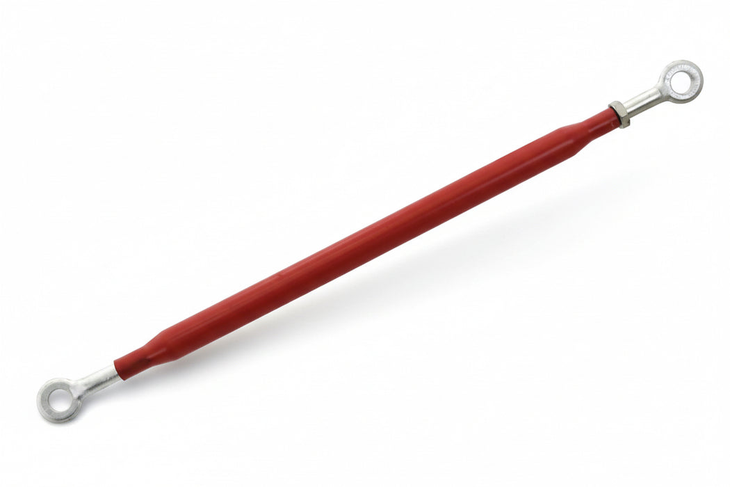 Red metal bar with eye bolts on a white background