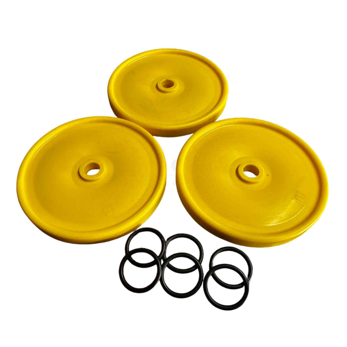 Three yellow circular parts with a central hole and six black rubber washers on a white background.