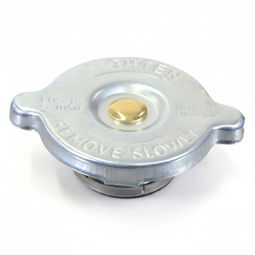 Tractor radiator cap on white back ground
