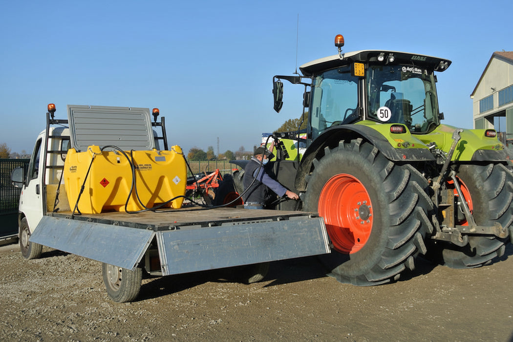 Refueling a tractor with Emiliana Sorbatoi fuel cell on back of vehicle