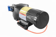 Mechanical pump with warning label on a white background