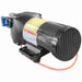 Mechanical pump with warning label on a white background