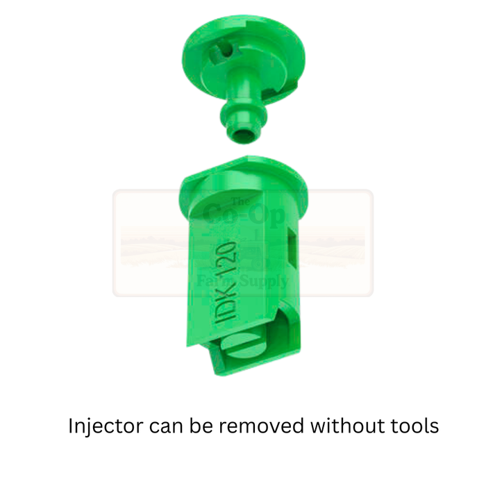 Green plastic injector with text on a white background
