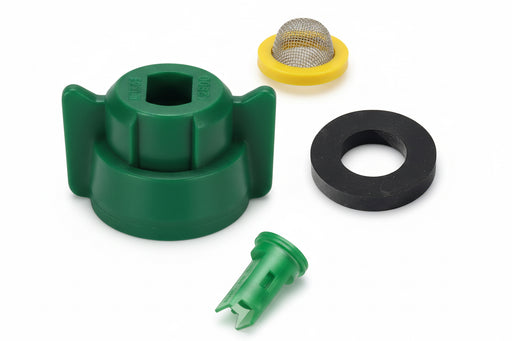 Set of green and black plumbing parts on a white background