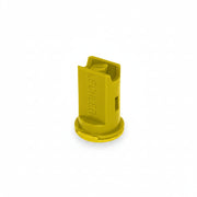 Yellow plastic component on a white background