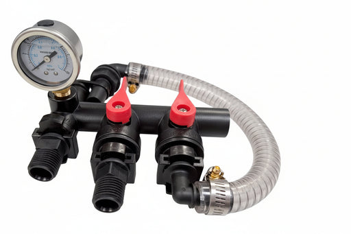 Pump manifold with gauges and hoses on a white background