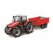 Red toy tractor with a red trailer on a white background