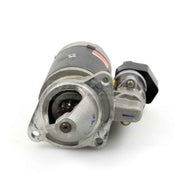 Tractor starter motor on a white background