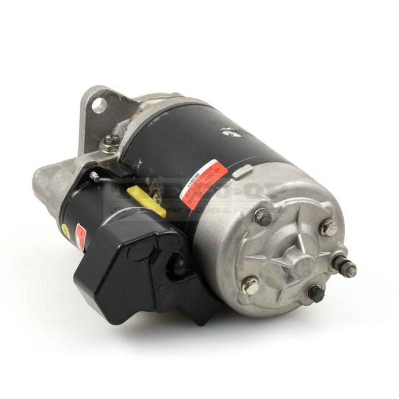 Tractor starter motor on a white background