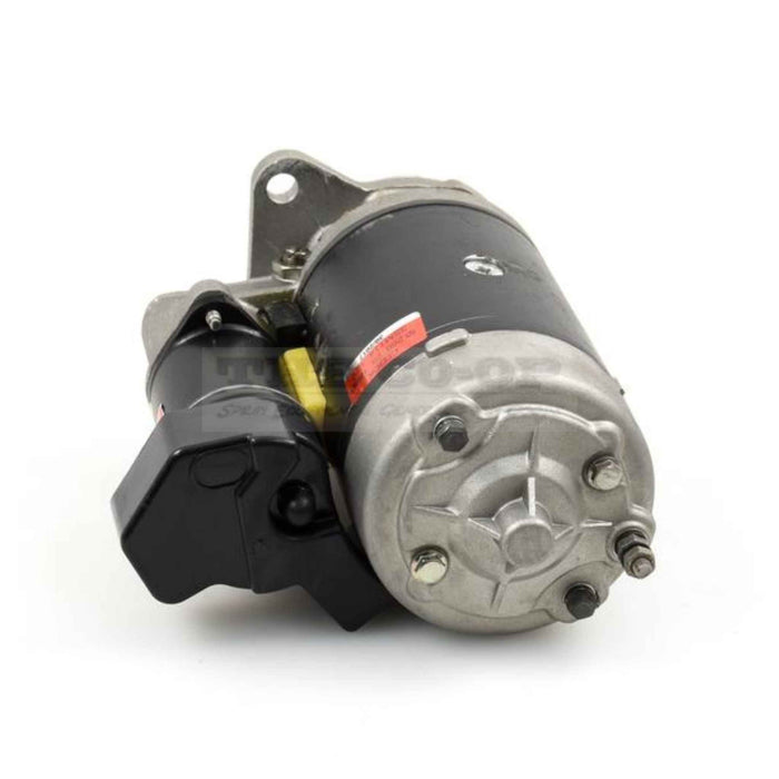 Tractor starter motor on a white background