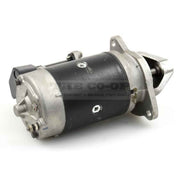Tractor starter motor on a white background