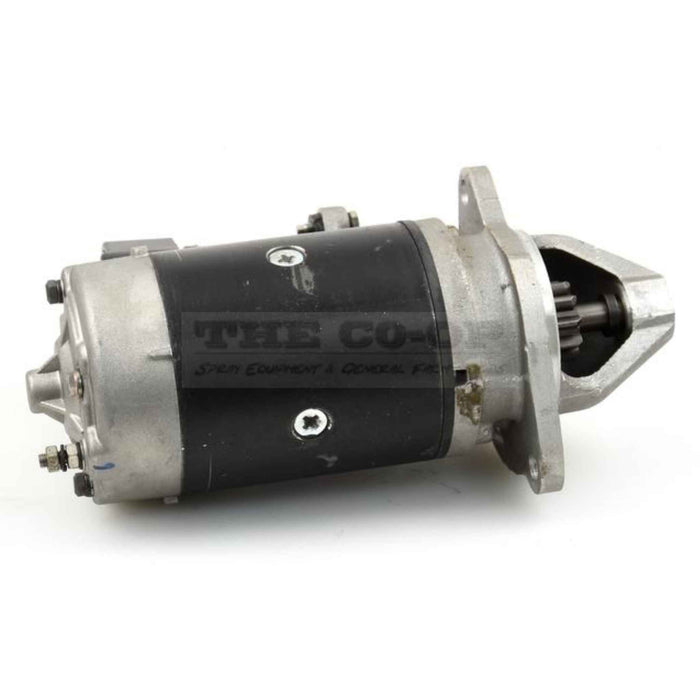 Tractor starter motor on a white background