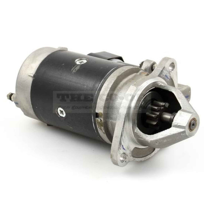 Tractor starter motor on a white background