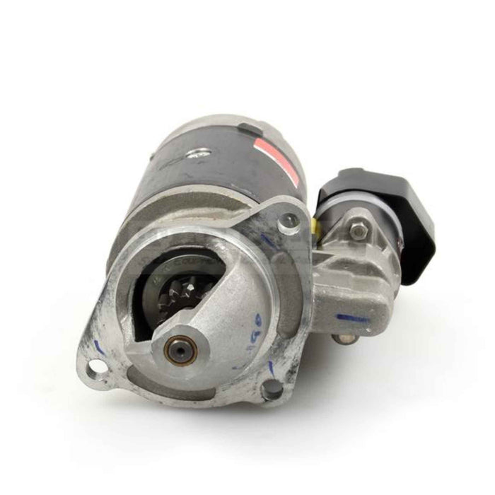 Tractor starter motor on a white background