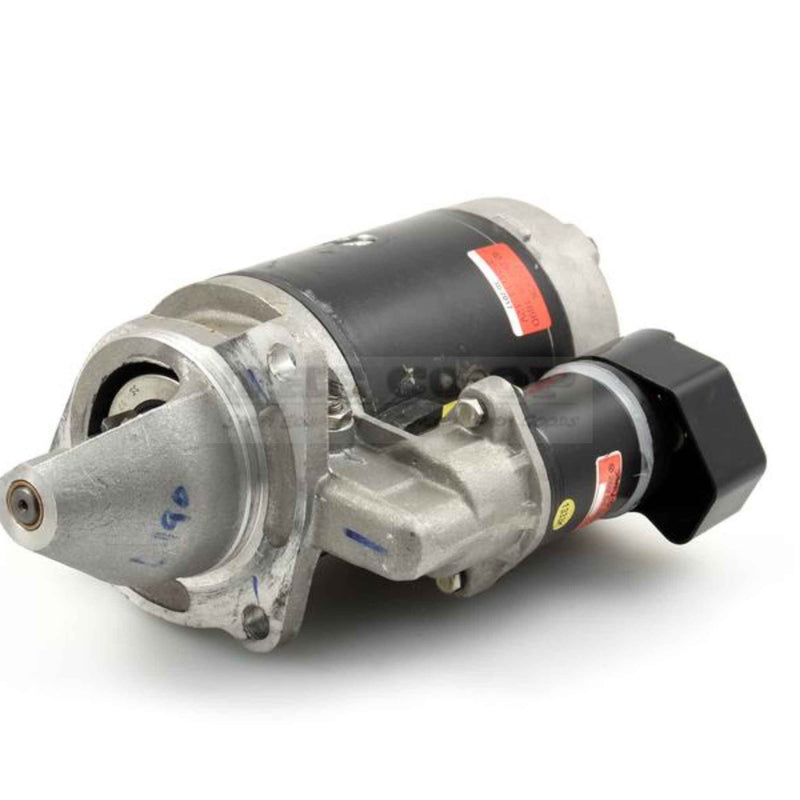 Tractor starter motor on a white background