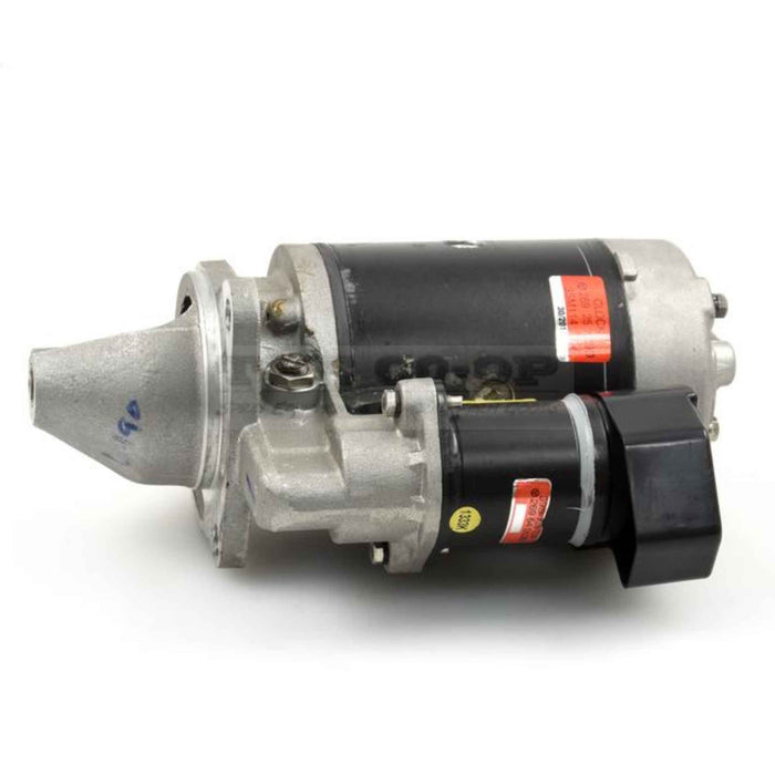 Tractor starter motor on a white background