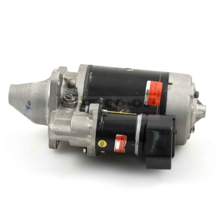 Tractor starter motor on a white background