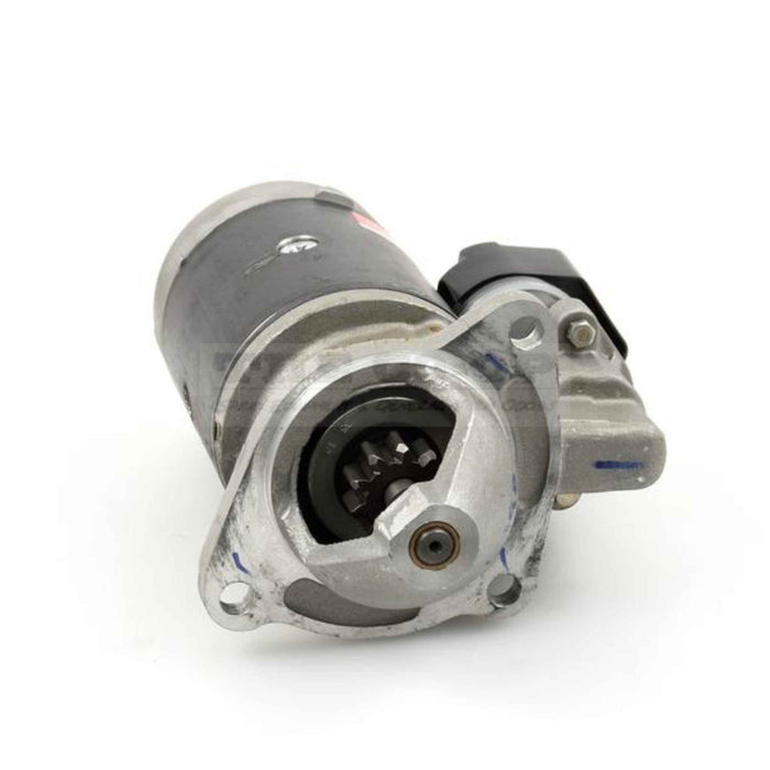 Tractor starter motor on a white background