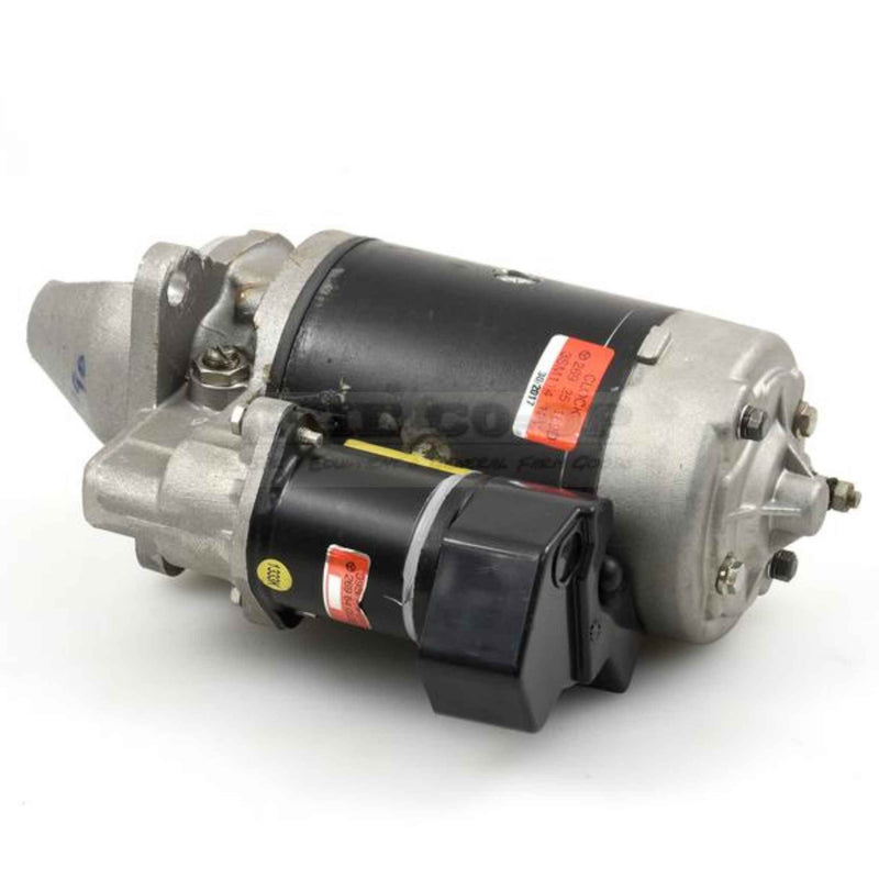 Tractor starter motor on a white background