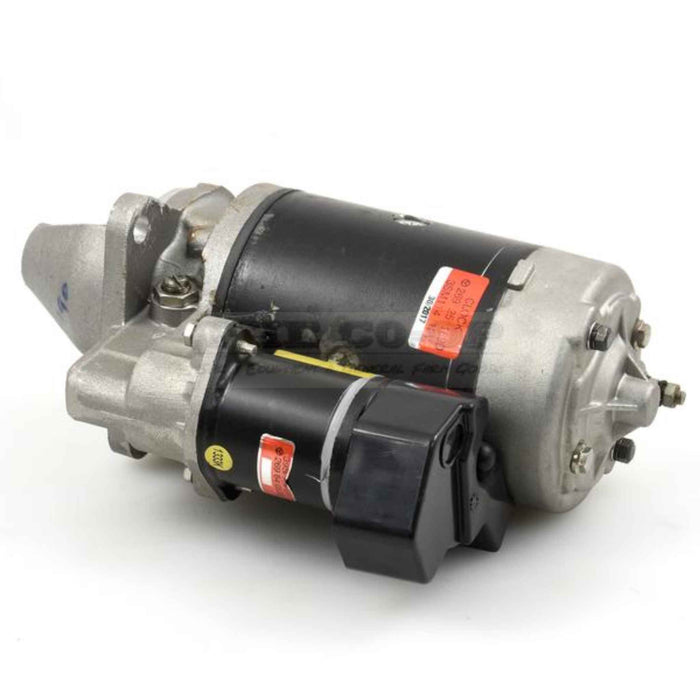 Tractor starter motor on a white background