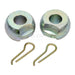 Two metal bushings and two spring clips on a white background