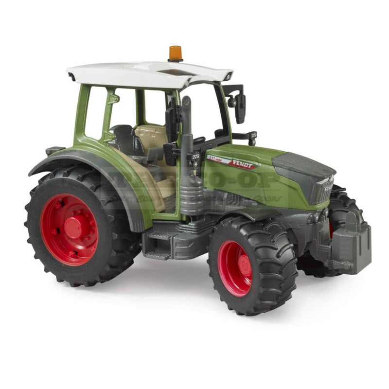 Toy model Fendt tractor with green body, red wheels, and gray accents on a white background