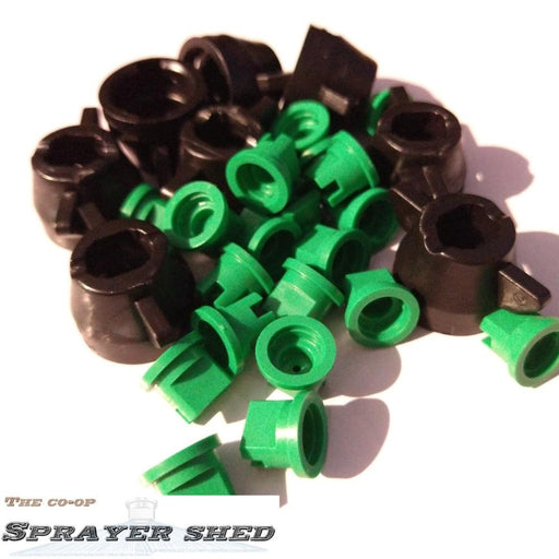 green fan spray nozzle with hard[i teejet conversion cap